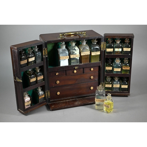 1154 - A 19th century mahogany apothecary box, fitted with glass bottles and drawers with ivory knobs, encl... 