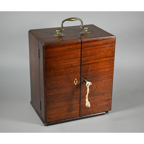 1154 - A 19th century mahogany apothecary box, fitted with glass bottles and drawers with ivory knobs, encl... 