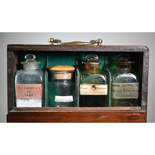 1154 - A 19th century mahogany apothecary box, fitted with glass bottles and drawers with ivory knobs, encl... 