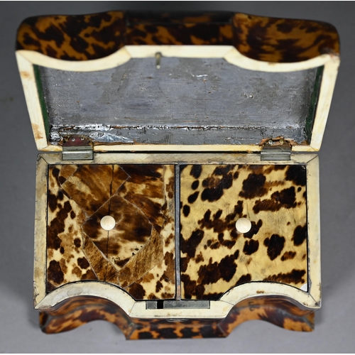 1160 - A Victorian serpentine-front tortoiseshell tea caddy with two inner lidded compartments, on ivory ba... 