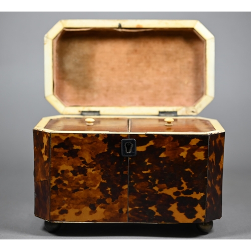 1161 - A Regency tortoiseshell sarcophagus tea caddy with moulded top enclosing two lidded compartments, on... 