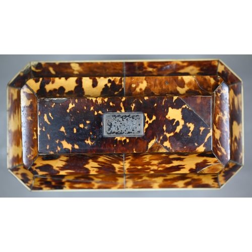 1161 - A Regency tortoiseshell sarcophagus tea caddy with moulded top enclosing two lidded compartments, on... 