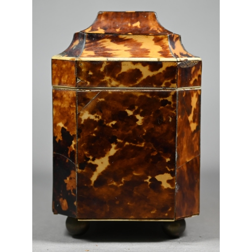 1161 - A Regency tortoiseshell sarcophagus tea caddy with moulded top enclosing two lidded compartments, on... 