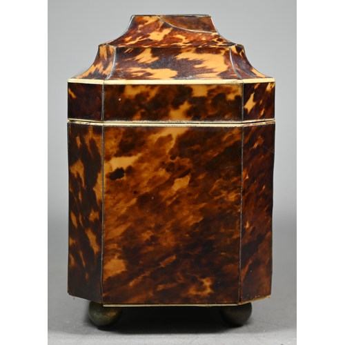 1161 - A Regency tortoiseshell sarcophagus tea caddy with moulded top enclosing two lidded compartments, on... 