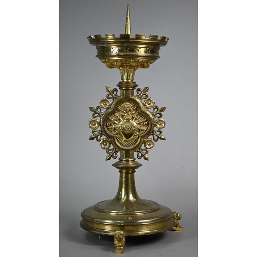 1162 - A set of four 19th century Gothic Revival brass 'Sacré Coeur' candlesticks attributed to Hardman &am... 