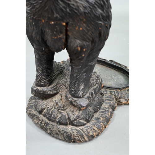 1165 - A 19th century Black Forest carved bear stick stand, with glass eyes and tin liner 86 cm high Lacks ... 