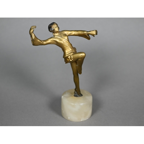 1167 - An Art Deco gilt-patinated bronzed figure of a dancing girl, unsigned, 12 cm high