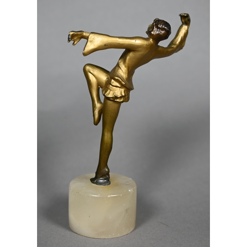 1167 - An Art Deco gilt-patinated bronzed figure of a dancing girl, unsigned, 12 cm high