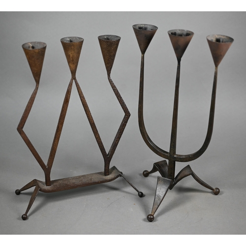 1168 - In the manner of Ambrose Heal, an iron table candelabra to/with another stamped HBV, Germany, 31 cm ... 