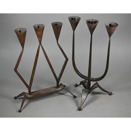 1168 - In the manner of Ambrose Heal, an iron table candelabra to/with another stamped HBV, Germany, 31 cm ... 