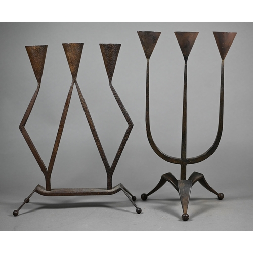 1168 - In the manner of Ambrose Heal, an iron table candelabra to/with another stamped HBV, Germany, 31 cm ... 