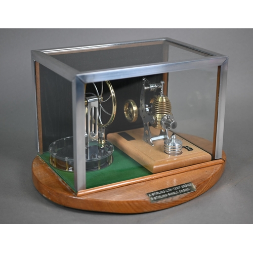 1179 - A Stirling low temperature Engine and a Stirling Single Engine, together in one glazed display case