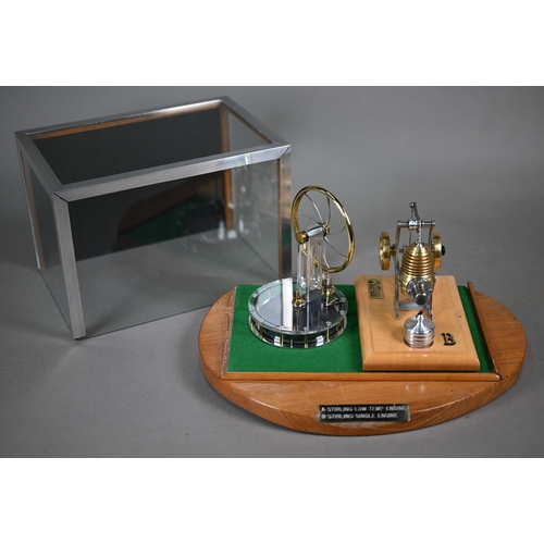 1179 - A Stirling low temperature Engine and a Stirling Single Engine, together in one glazed display case