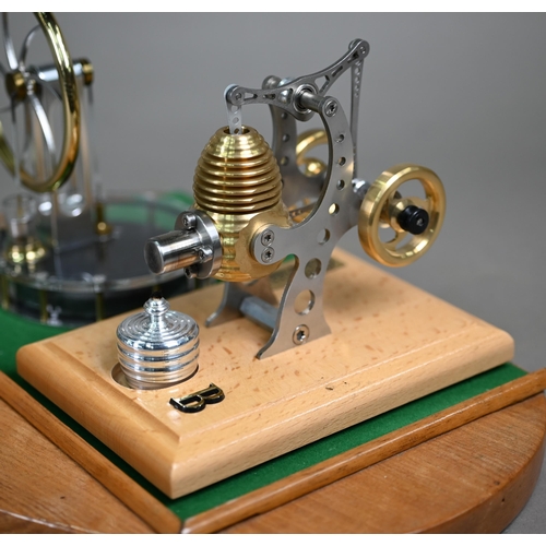 1179 - A Stirling low temperature Engine and a Stirling Single Engine, together in one glazed display case