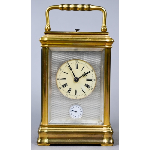 779 - A 19th century French brass carriage alarm clock, the two train 8-day grande sonnerie and petite son... 