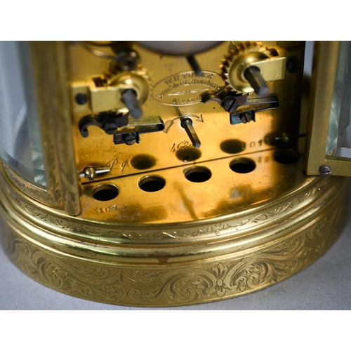 780 - W H Tooke, Paris, an engraved oval brass alarm carriage clock, the two train movement no 1013 with R... 