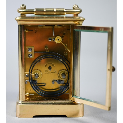 783 - A gilt-cased two train 8-day carriage alarm clock with white enamelled and Roman numeral dial, 13.5 ... 