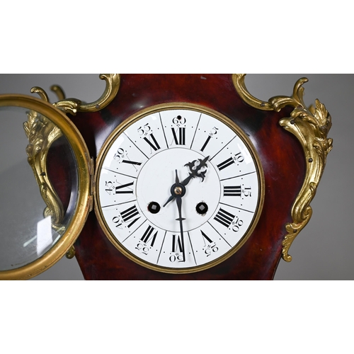 786 - An antique French two train mantel clock in faux red tortoiseshell and ormolu case in the rococo sty... 