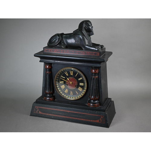 795 - A Victorian Egyptian Revival slate mantel clock, surmounted by a bronzed sphinx, the black dial with... 