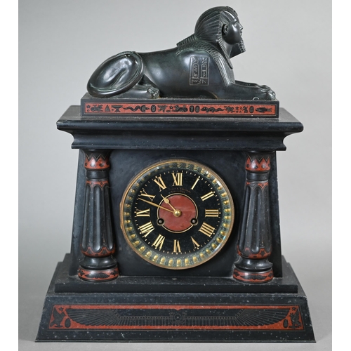 795 - A Victorian Egyptian Revival slate mantel clock, surmounted by a bronzed sphinx, the black dial with... 