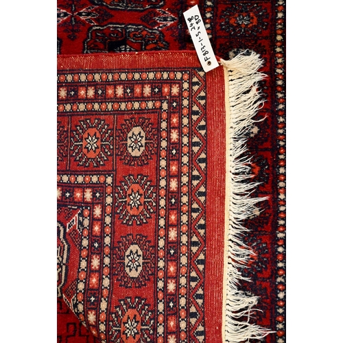 811 - A Turkoman Teke design red ground runner, 248 cm x 80 cm