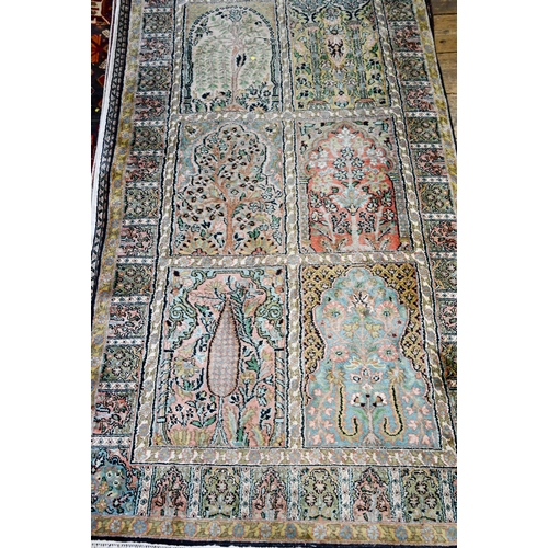 813 - A Persian part silk runner, with tree of life and garden tile designs, 295 cm x 95 cm