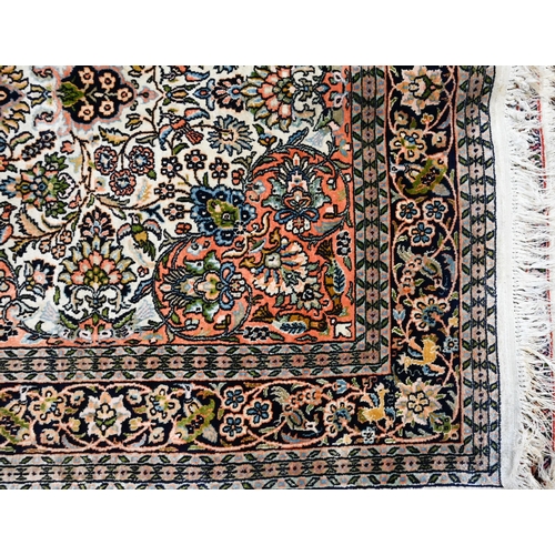 814 - A vintage Kashan silk Kashan design rug, the cream ground centred by a medallion, 160 cm x 92 cm