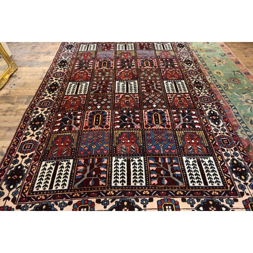 824 - A mid-century Persian Baktiari tile design carpet, 313 cm x 212 cm