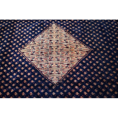 828 - A contemporary central Persian Arak carpet, the predominantly blue ground with repeating design of s... 