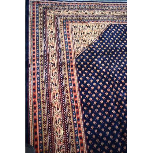 828 - A contemporary central Persian Arak carpet, the predominantly blue ground with repeating design of s... 