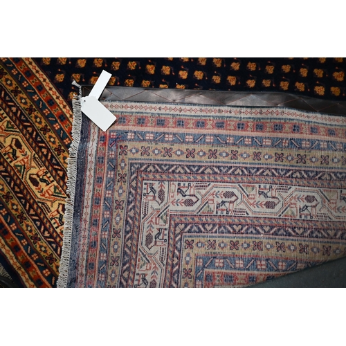 828 - A contemporary central Persian Arak carpet, the predominantly blue ground with repeating design of s... 