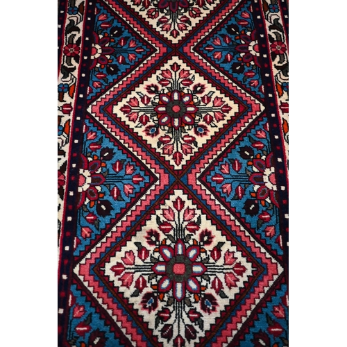 834 - A contemporary North West Persian Rudbar runner, the mid-blue lozenge pole design on camel ground, 3... 