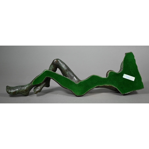 856 - Charlotte Jackson - A verdigris patinated bronze sculpture of a reclining woman, 42 cm long