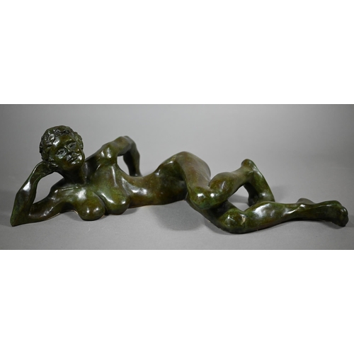 857 - Charlotte Jackson - A verdigris patinated bronze of a reclining nude woman, 49 cm long