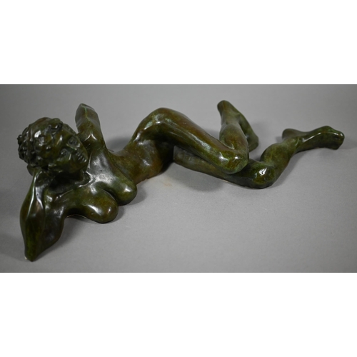 857 - Charlotte Jackson - A verdigris patinated bronze of a reclining nude woman, 49 cm long