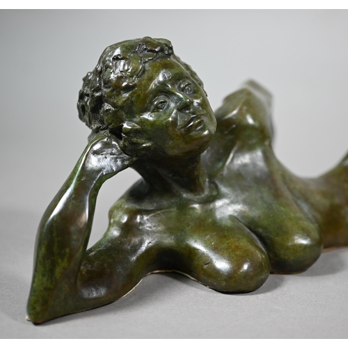 857 - Charlotte Jackson - A verdigris patinated bronze of a reclining nude woman, 49 cm long