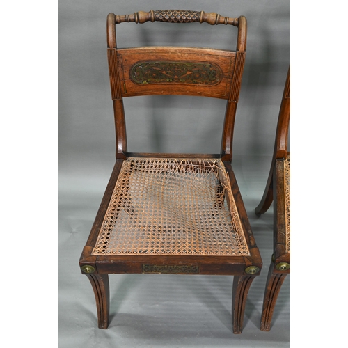 863 - A set of five Regency brass inlaid mahogany caned seat side chairs with sabre front legs to/w four o... 