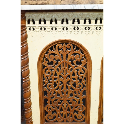 864 - A Victorian Puginesque style cast iron radiator cover, with lobed corner veined white marble top, 10... 