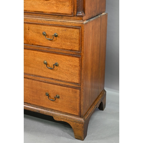 870 - A George III cross-banded oak chest on chest, the moulded cornice with inlaid boxwood roundels, over... 