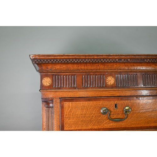 870 - A George III cross-banded oak chest on chest, the moulded cornice with inlaid boxwood roundels, over... 