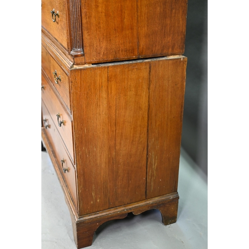 870 - A George III cross-banded oak chest on chest, the moulded cornice with inlaid boxwood roundels, over... 