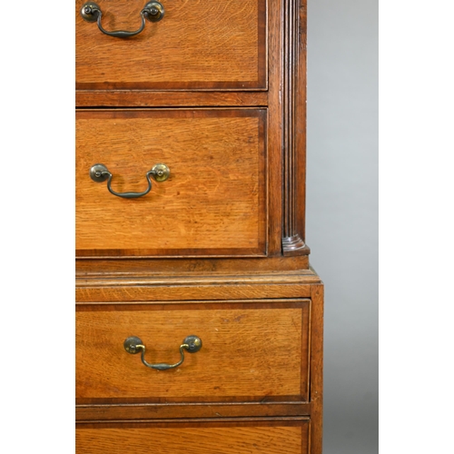 870 - A George III cross-banded oak chest on chest, the moulded cornice with inlaid boxwood roundels, over... 