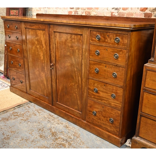 872 - Holland & Son, a late 19th century satinwood low compactum, centred by a pair of cabinet doors e... 