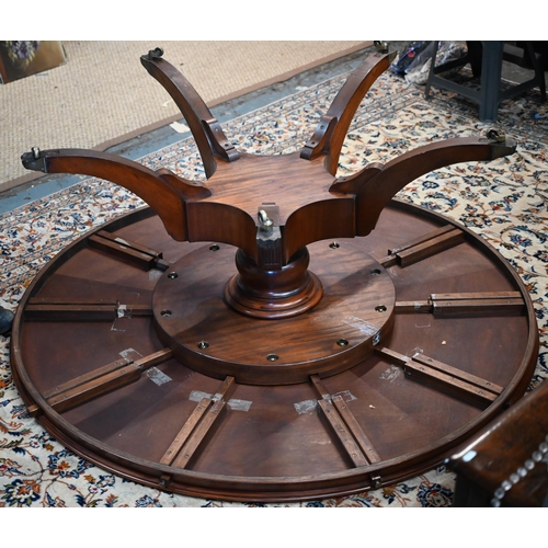 875 - A large George IV style circular extending mahogany dining table by Arthur Brett model 2239 'Mayfair... 