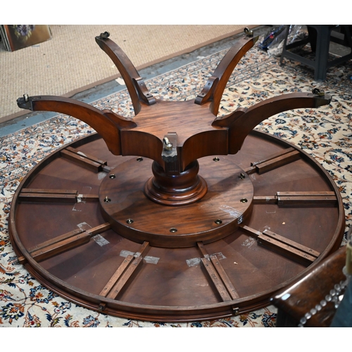 875 - A large George IV style circular extending mahogany dining table by Arthur Brett model 2239 'Mayfair... 