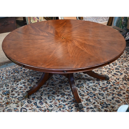 875 - A large George IV style circular extending mahogany dining table by Arthur Brett model 2239 'Mayfair... 