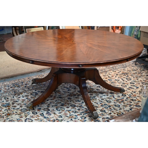 875 - A large George IV style circular extending mahogany dining table by Arthur Brett model 2239 'Mayfair... 