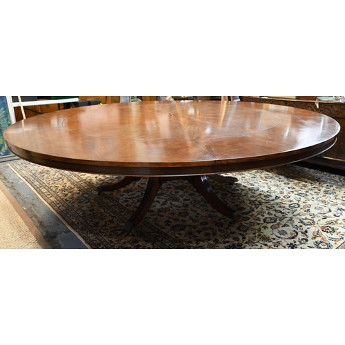 875 - A large George IV style circular extending mahogany dining table by Arthur Brett model 2239 'Mayfair... 