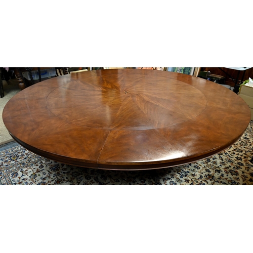 875 - A large George IV style circular extending mahogany dining table by Arthur Brett model 2239 'Mayfair... 