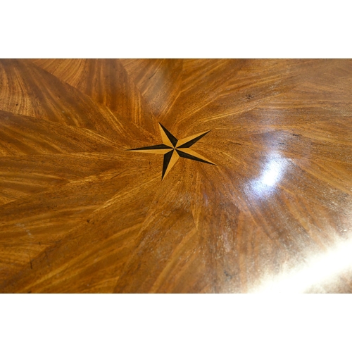 875 - A large George IV style circular extending mahogany dining table by Arthur Brett model 2239 'Mayfair... 